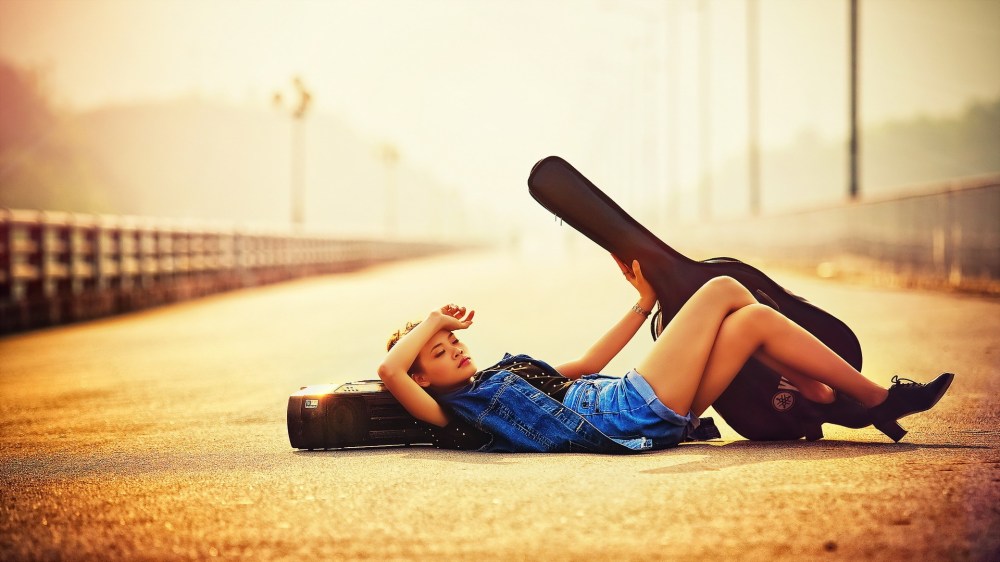Guitar-girl-lying-on-road-sunlight_1920x1080