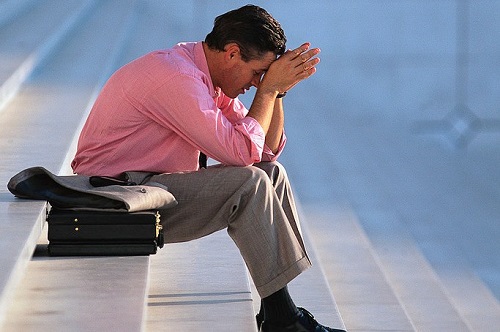 Businessman Thinking on Steps Paris, France